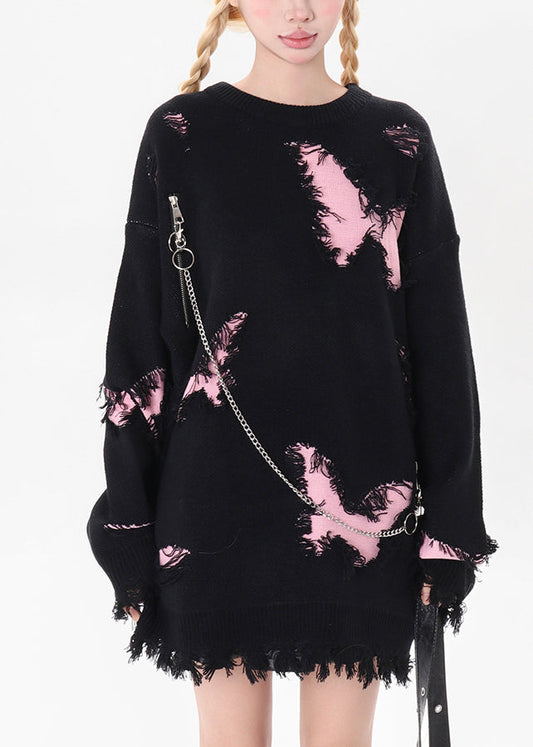 Schwarzer Strickpullover mit Schmetterlingslöchern und Kettenmuster für den Winter