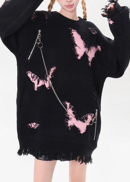 Schwarzer Strickpullover mit Schmetterlingslöchern und Kettenmuster für den Winter