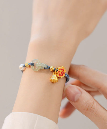 Pulsera de cadena de loto con perla y hebilla de ping con cobre dorado y tejido a mano en azul artístico