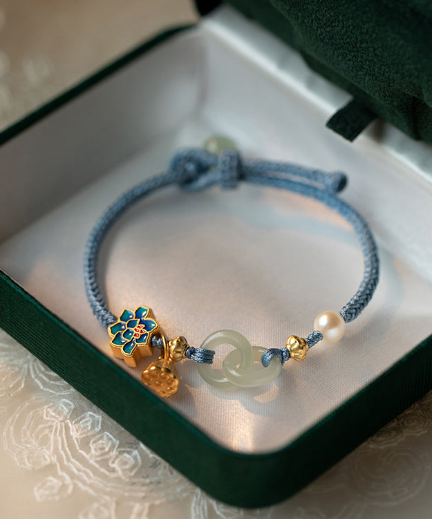 Pulsera de cadena de loto con perla y hebilla de ping con cobre dorado y tejido a mano en azul artístico