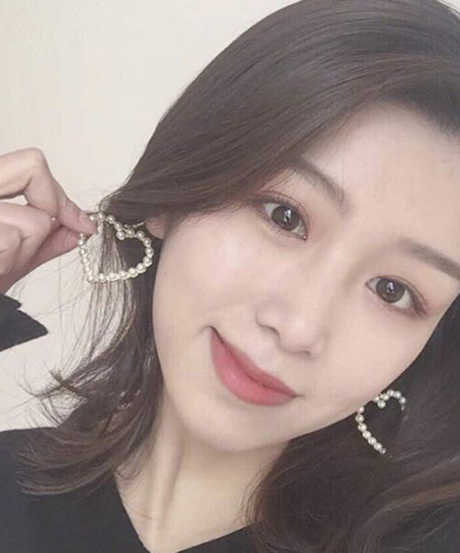 Pendientes colgantes de perlas de aleación de oro con diseño artístico