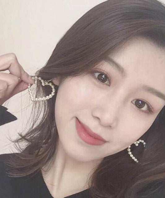 Pendientes colgantes de perlas de aleación de oro con diseño artístico