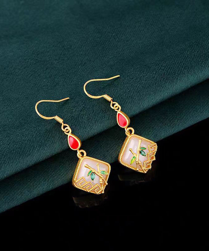 Pendientes colgantes de hoja de bambú con incrustaciones de jade y gemas de cobre dorado