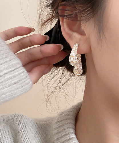 Pendientes de aro con circonitas de cobre y oro artístico