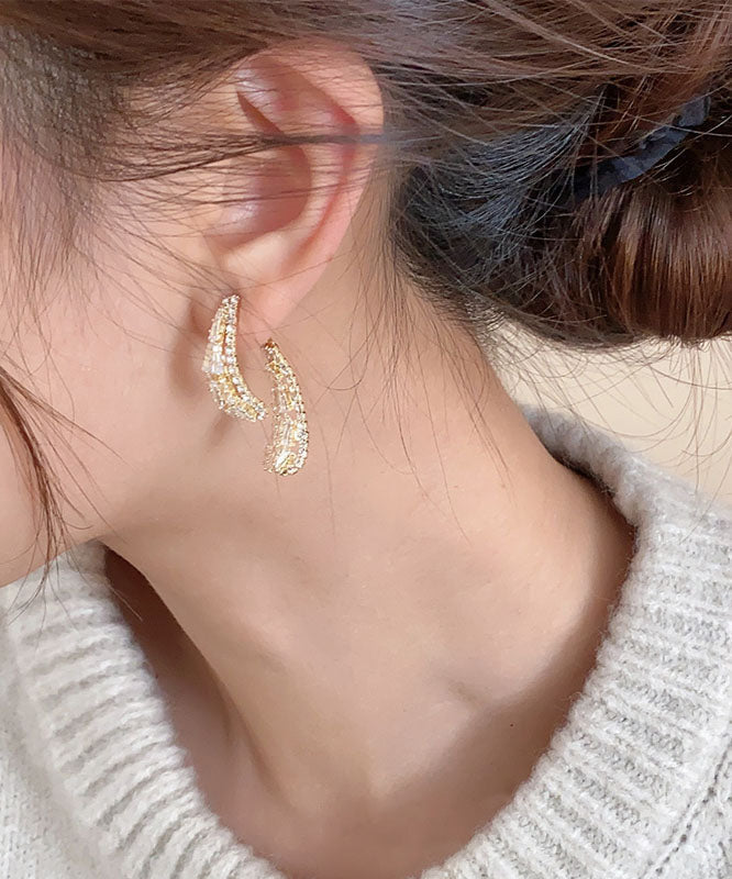 Pendientes de aro con circonitas de cobre y oro artístico