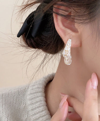 Pendientes de aro con circonitas de cobre y oro artístico