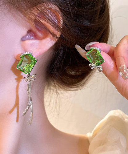 Pendientes asimétricos con borlas y lazo de cristal con circonitas de cobre verde Art Grass