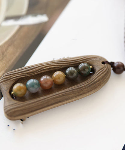 Collar con colgante de seis perlas tejido a mano en color caqui artístico