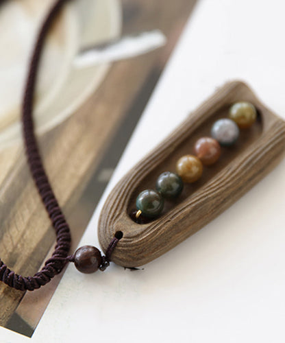 Collar con colgante de seis perlas tejido a mano en color caqui artístico