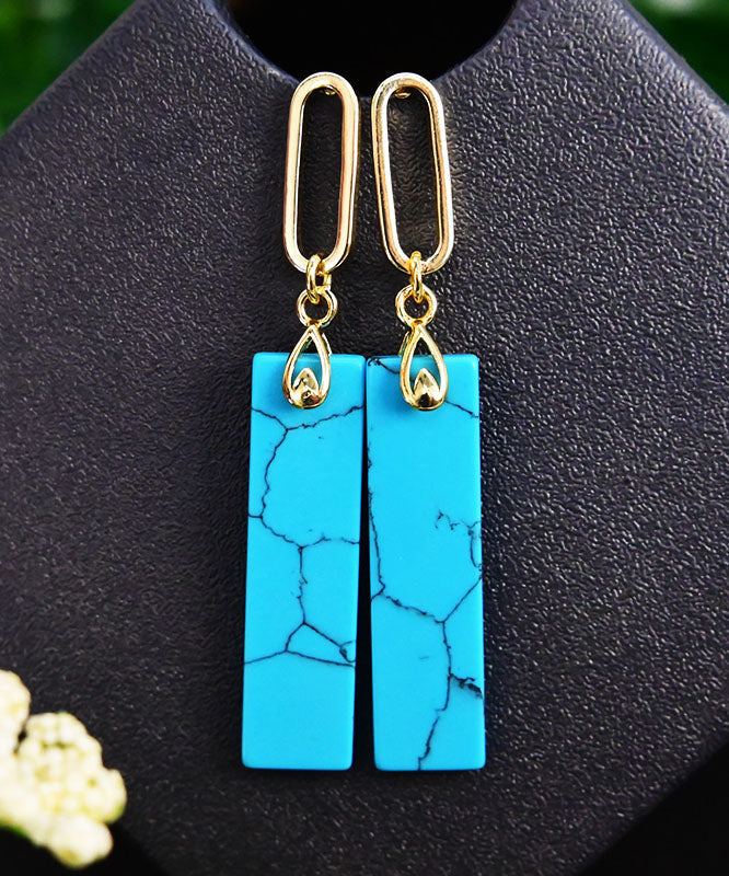 Pendientes colgantes de turquesa dorada en plata de ley verde claro