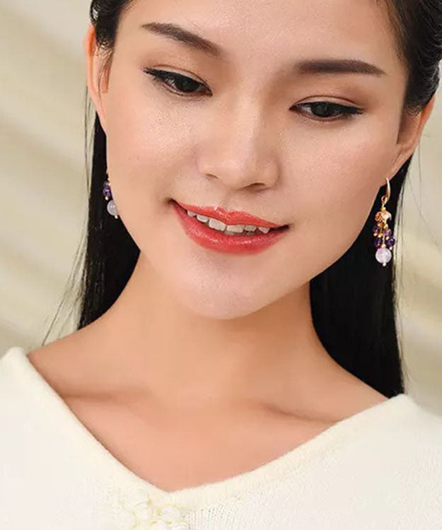 Pendientes colgantes de cristal de oro de 14 quilates en color morado claro