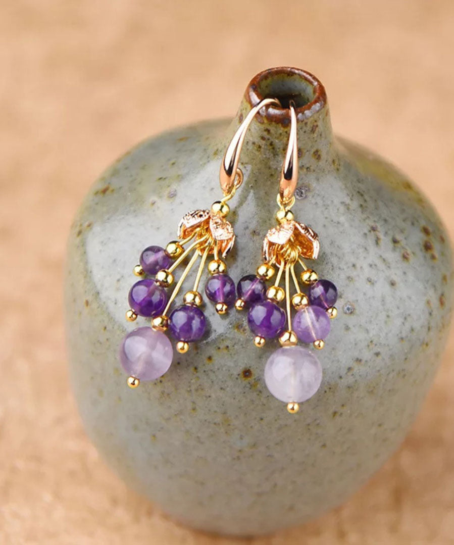 Pendientes colgantes de cristal de oro de 14 quilates en color morado claro