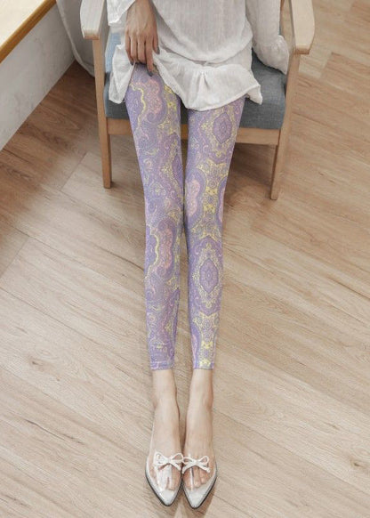 Leggings mit hellviolettem Print, gerafftem Mesh-Einsatz am Po und Capri-Leggings