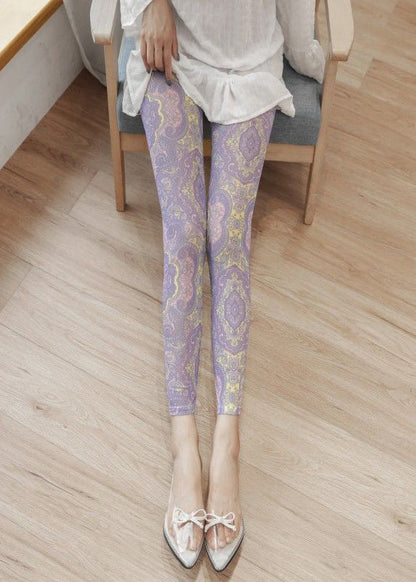 Leggings mit hellviolettem Print, gerafftem Mesh-Einsatz am Po und Capri-Leggings