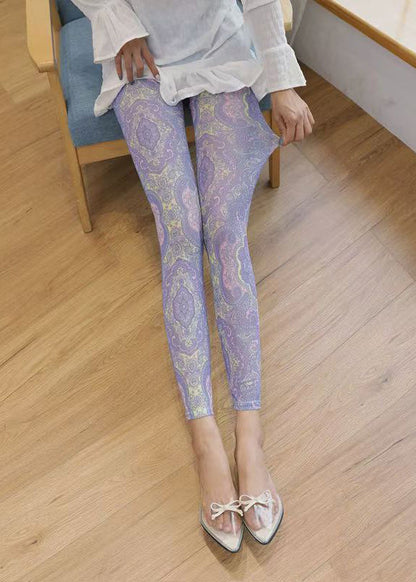 Leggings mit hellviolettem Print, gerafftem Mesh-Einsatz am Po und Capri-Leggings