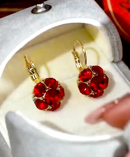 Pendientes de aro con circonitas doradas de cobre rosa