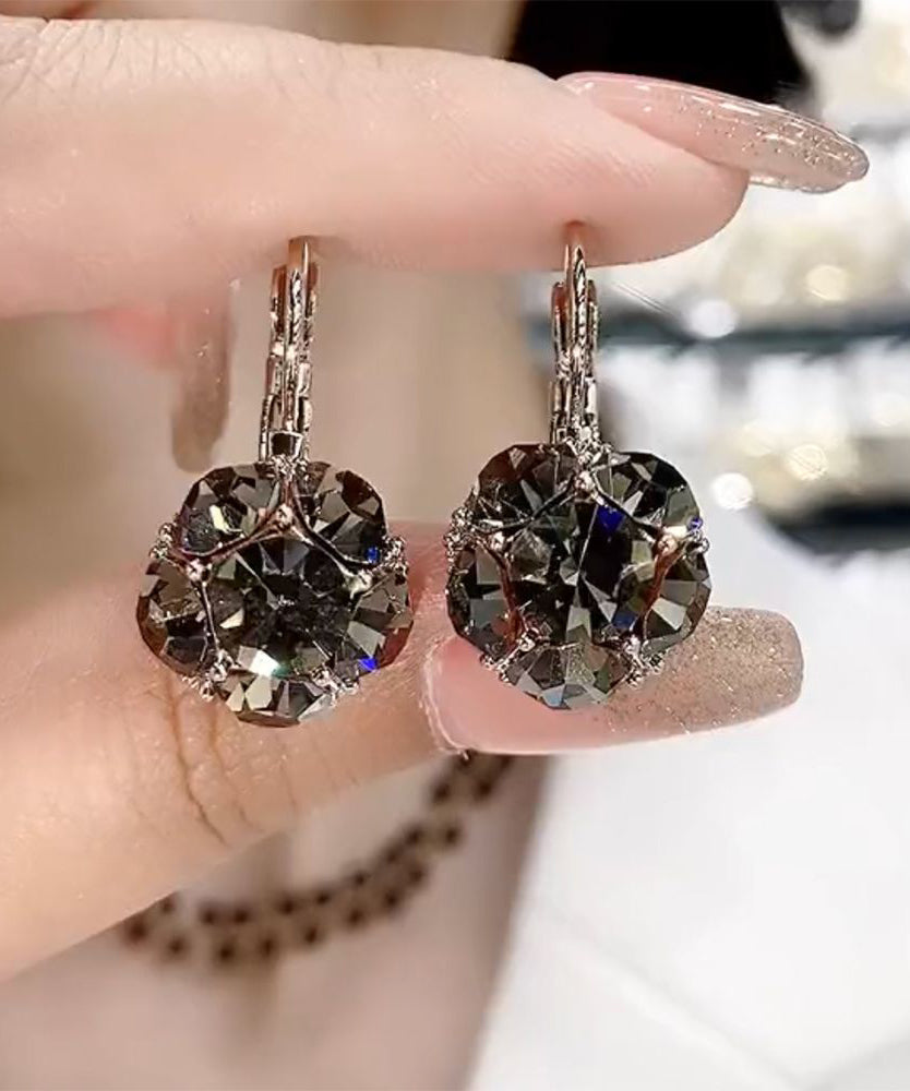 Pendientes de aro con circonitas doradas de cobre rosa