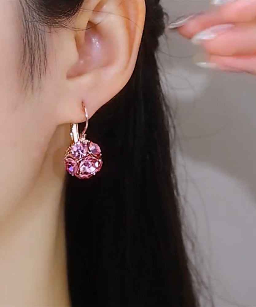 Pendientes de aro con circonitas doradas de cobre rosa
