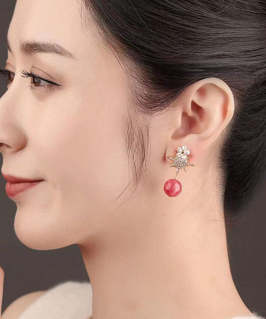 Pendientes colgantes con diseño floral de concha y gemas de circonita en plata de ley rosa