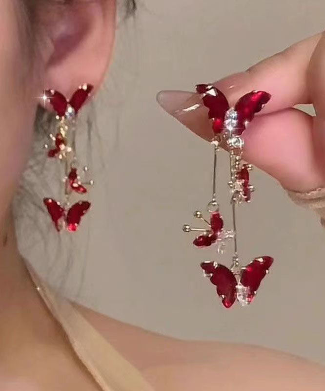 Pendientes colgantes con borlas de mariposa de cristal de aleación morada