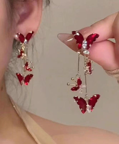 Pendientes colgantes con borlas de mariposa de cristal de aleación morada