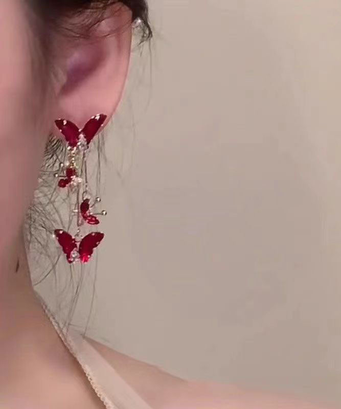 Pendientes colgantes con borlas de mariposa de cristal de aleación morada