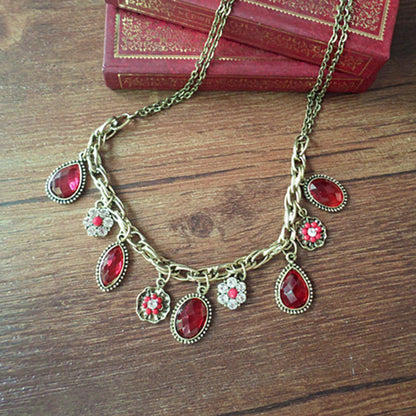Collar con colgante de circonita y gema de aleación roja artística