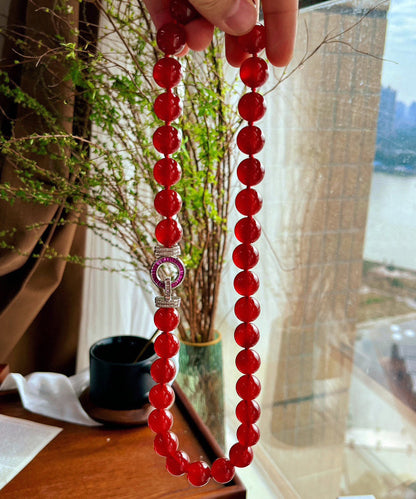 Collar de cuentas graduadas de ágata roja tejida a mano