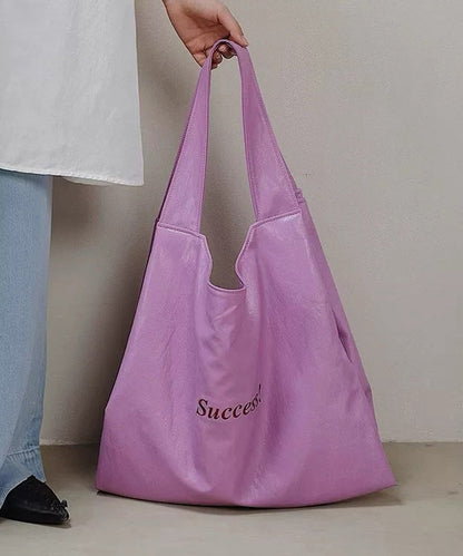 Bolso de hombro de piel sintética de gran capacidad con letras rojas artísticas