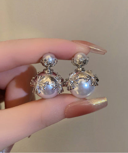 Pendientes de acero inoxidable blanco con incrustaciones de perlas