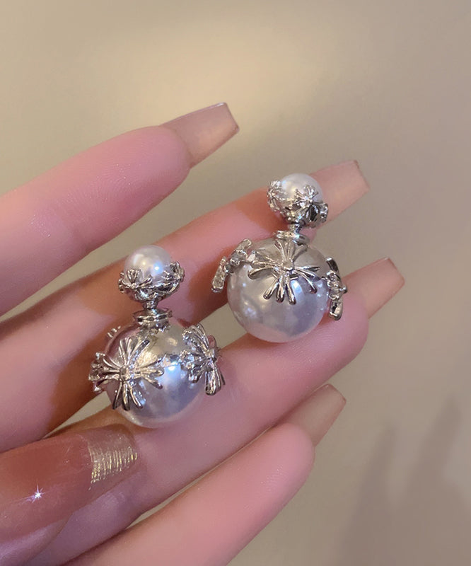 Pendientes de acero inoxidable blanco con incrustaciones de perlas