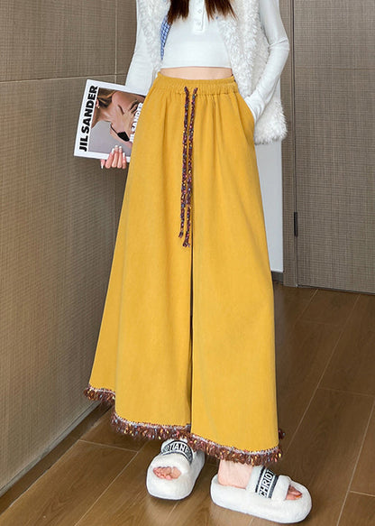 Kunstgelbe Cord-Crop-Hose mit Quasten und elastischem Bund für den Herbst
