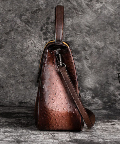 Schöne braune Umhängetasche aus Kalbsleder mit Paitings-Motiven