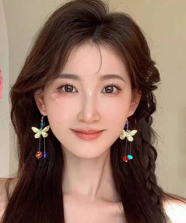Hermosos aretes colgantes con borlas y cuentas de mariposa de aleación con bloques de color