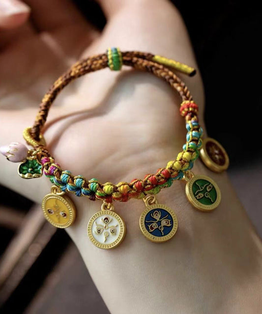 Hermosa pulsera con dije de borlas doradas en plata esterlina con bloques de color