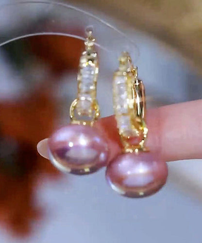 Hermosos aretes colgantes de perla y circonita de aleación de cobre y oro