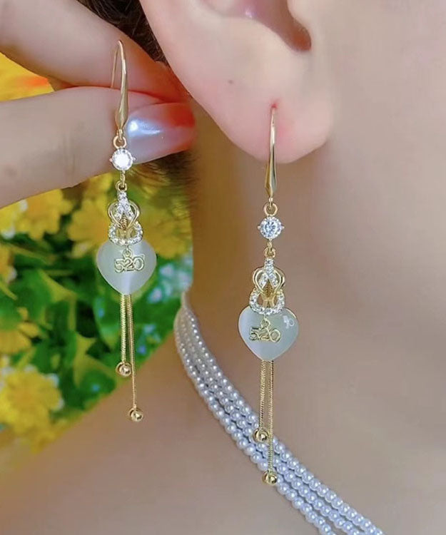 Hermosos aretes colgantes con borlas de amor de cobre dorado con incrustaciones de circonita 520