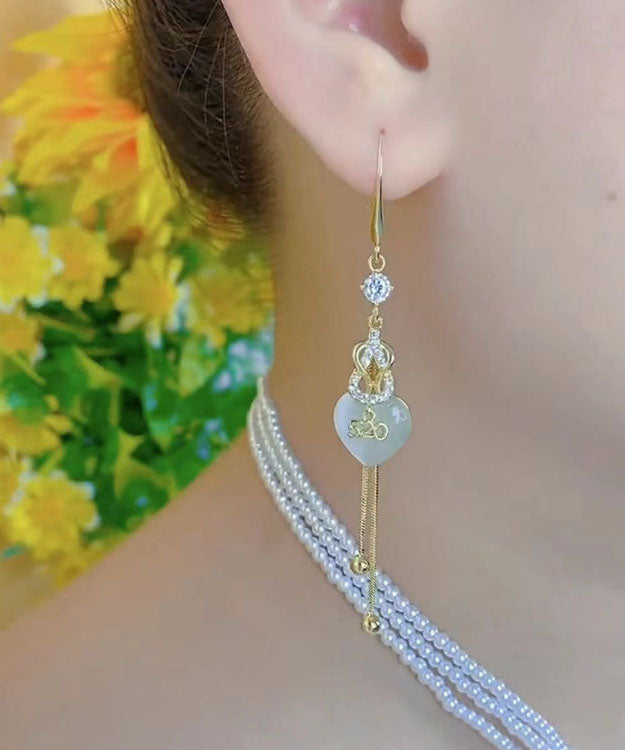 Hermosos aretes colgantes con borlas de amor de cobre dorado con incrustaciones de circonita 520