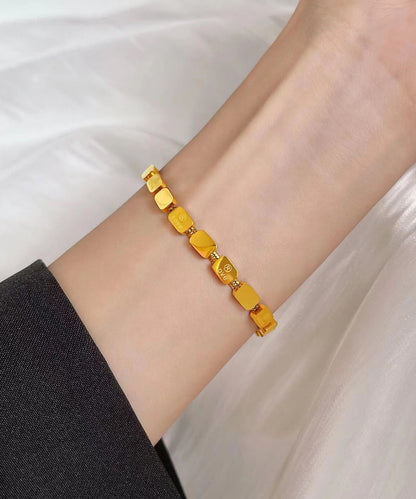 Wunderschönes goldenes Edelstahl-Armband mit Schlangenknochen-Kette und quadratischem Anhänger