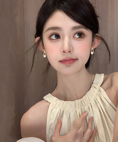 Hermosos aretes de perla y circonita de aleación de plata esterlina y oro