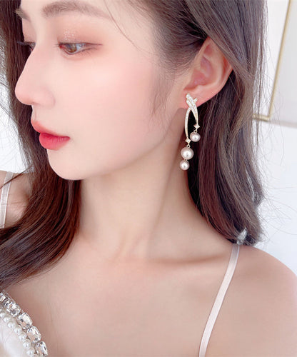 Hermosos aretes colgantes de plata esterlina dorada con perla y circonita