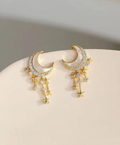 Hermosos aretes colgantes de luna y estrella con circonitas doradas en plata esterlina