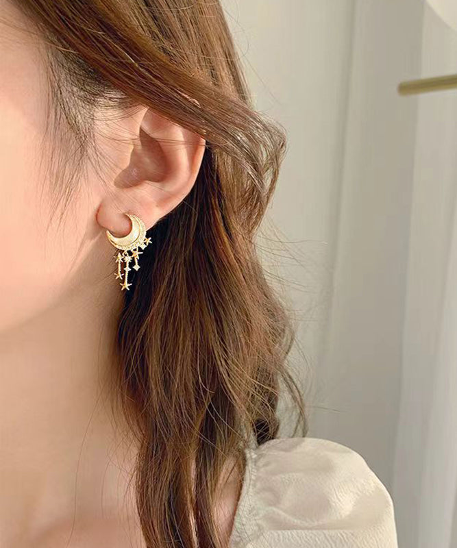 Hermosos aretes colgantes de luna y estrella con circonitas doradas en plata esterlina