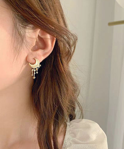 Hermosos aretes colgantes de luna y estrella con circonitas doradas en plata esterlina