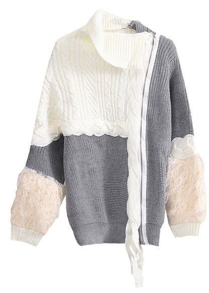 Schöner grauer Patchwork-Strickpullover mit Reißverschluss für den Frühling