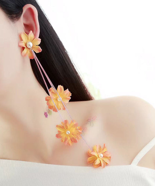 Wunderschöne hellgelbe Perlen-Tropfenohrringe mit Blumenquaste