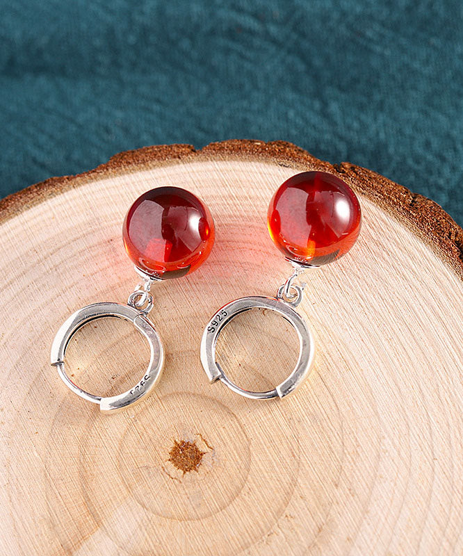 Hermosos aretes colgantes de granate con incrustaciones de plata de ley morera