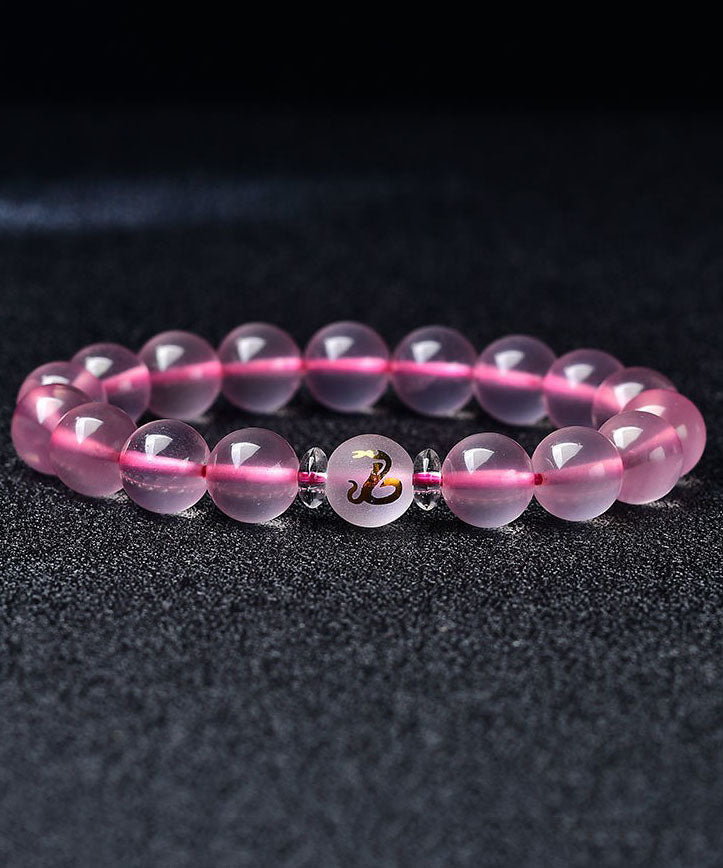 Wunderschönes Armband mit den zwölf chinesischen Tierkreiszeichen aus rosa Kristall