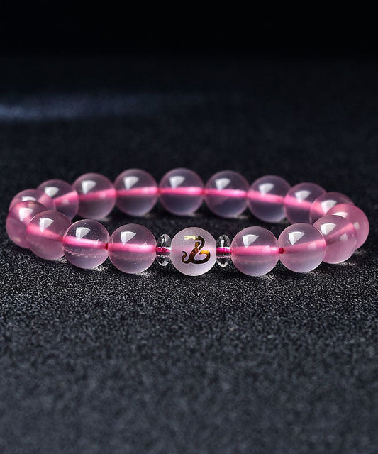 Wunderschönes Armband mit den zwölf chinesischen Tierkreiszeichen aus rosa Kristall