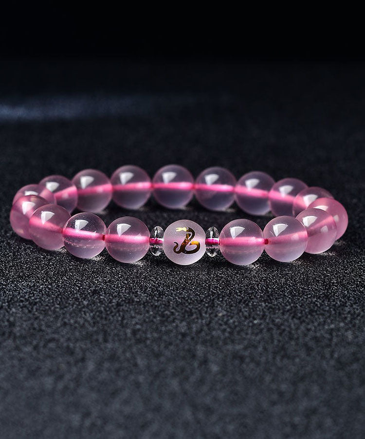 Wunderschönes Armband mit den zwölf chinesischen Tierkreiszeichen aus rosa Kristall